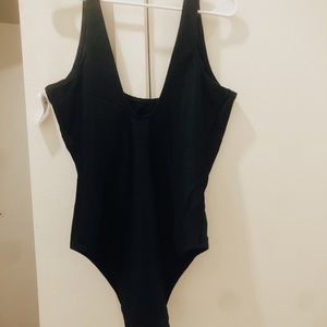New with tags black scoop back one piece swimsuit